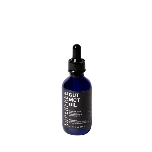 Blue bottle of Superfree Gut MCT Oil with a dropper on a white background