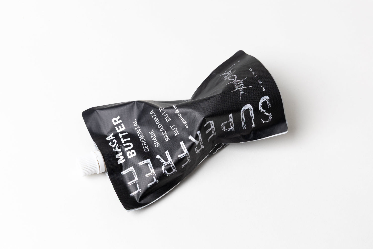 maca butter pouch squeezed