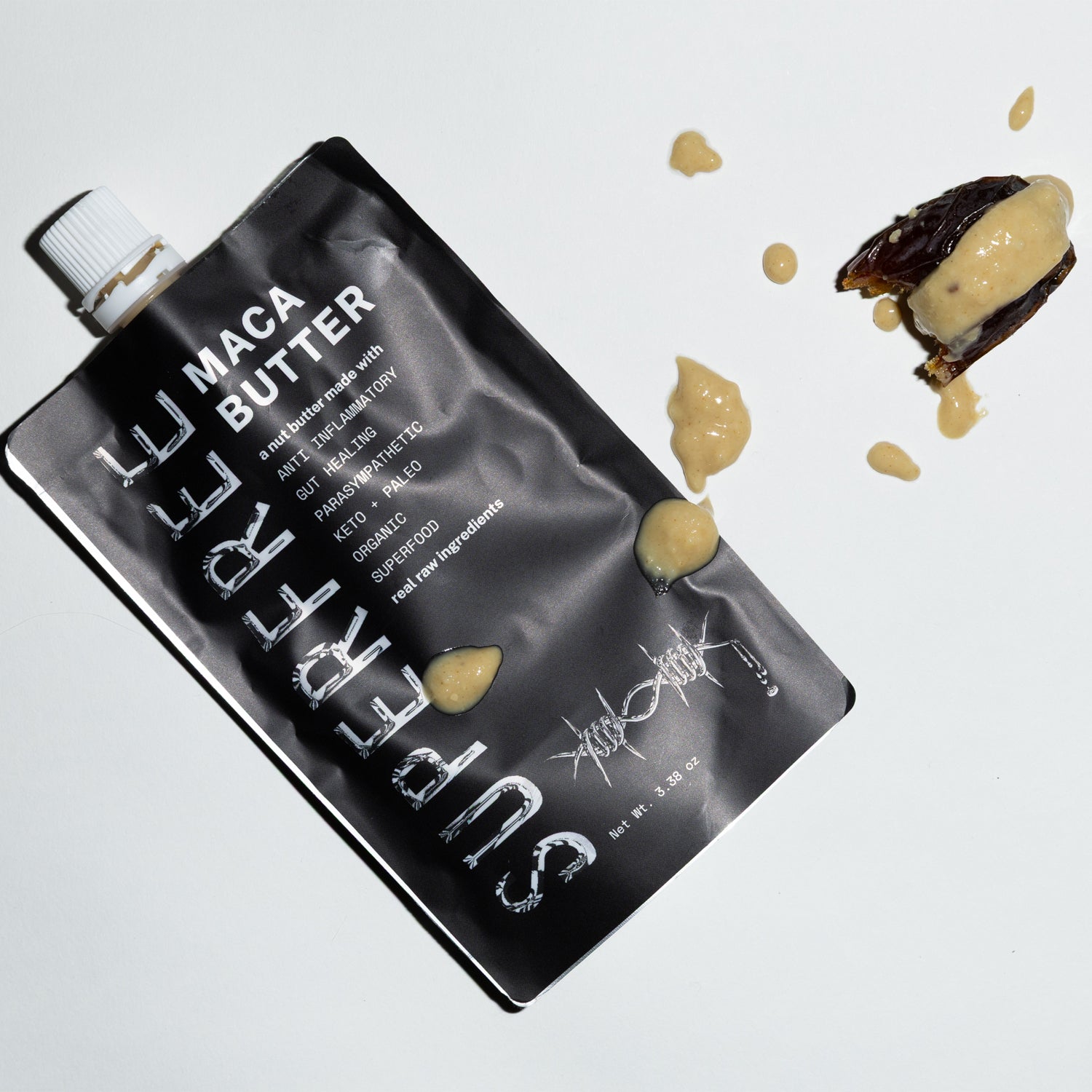 Maca Butter pouch and a stuffed date with a bite taken out